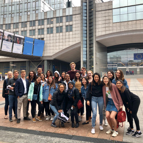 The group poses for a photo outside the EU Parliament building.